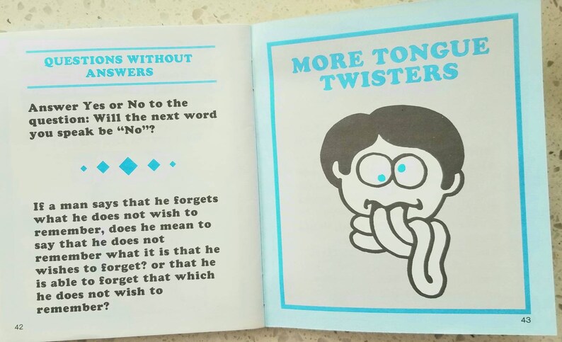 May include: A page from a book with the title "More Tongue Twisters" and a cartoon illustration of a person with their tongue sticking out. The text on the page asks a question about forgetting things.
