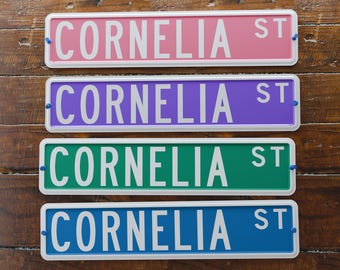 4x18 Inch CORNELIA ST Sign, Stamped Aluminum Novelty Decor, Pink, Purple, Green, Blue