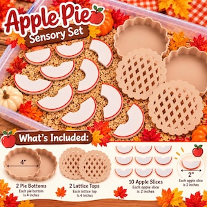 Może przedstawiać: Zestaw sensoryczny Apple Pie zawierający dwa spody do ciasta o średnicy 10,16 cm, dwie kratkowane pokrywki o średnicy 10,16 cm oraz dziesięć plasterków jabłka o średnicy 5,08 cm. Elementy są beżowe i białe z czerwonymi brzegami na brązowym wypełnieniu.