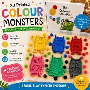 Peut inclure: Un ensemble de six figurines de monstres imprimées en 3D en plastique jaune, bleu, rouge, rose, vert et noir, chacune affichant une expression faciale différente. Les figurines sont disposées dans un bac en plastique transparent rempli de perles.