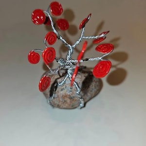 Small wire tree on a rock