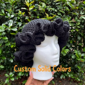 May include: Black crocheted shower cap with a ruffled edge. Custom Solid Colors.