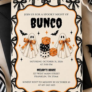 May include: A rectangular invitation card featuring a cream background with a black and orange border decorated with black bows. The text reads JOIN US FOR A SPOOKY NIGHT OF BUNCO, SATURDAY, OCTOBER 31, 2026 AT 5:00 PM, MELODY'S HOUSE, 327 WEST MAIN STREET, FRANKLIN, TN 37064, KINDLY RSVP TO MELODY BY OCTOBER 10 AT 615-242-1425. Two white ghosts with orange plaid bows and a stack of dice are centered.