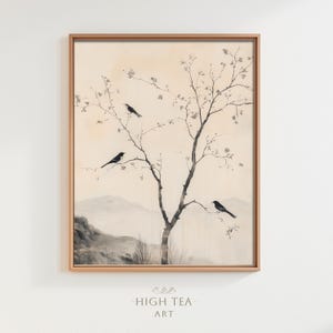 May include: A framed watercolor painting of a delicate tree with black birds perched on its branches. The background is a soft, muted beige with hints of gray, creating a serene and minimalist aesthetic.