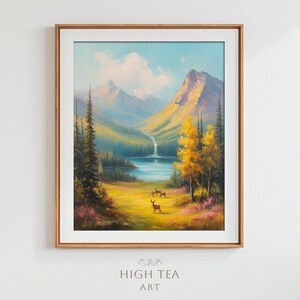 May include: A framed landscape painting depicts a mountain scene with a waterfall, lake, and deer. The artwork features a vibrant color palette of blues, greens, and yellows, with the text "-HIGH TEA- ART" at the bottom.