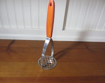 Sears Potato Masher with Orange Plastic Handle 019UT