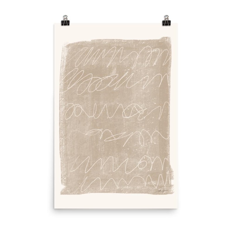 May include: Abstract art print with a beige background and white scribbles. The print has a textured look and a subtle distressed effect.