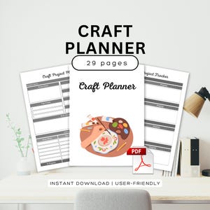 May include: A craft planner with the title "Craft Planner" and the text "29 pages" is displayed. The cover features an illustration of a hand painting on a plate. The words "Instant Download | User-Friendly" are also visible.