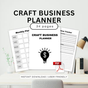 以下が含まれることがあります： 「CRAFT BUSINESS PLANNER」と「34ページ」の文字が入った白いクラフトビジネスプランナー。表紙にはドル記号の電球が描かれています。月間プランナーとクラフトショーのトラッカーが含まれています。PDFアイコンが表示されています。