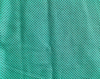 Swiss dot dark brown on dark aqua teal - 1 yard