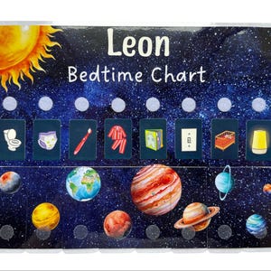 May include: A bedtime chart for Leon, featuring a starry night sky design with planets and a sun. The chart includes icons for bedtime routines like using the toilet, brushing teeth, and wearing pajamas.