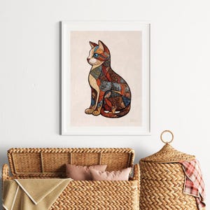 Peut inclure: Impression d'art encadr&eacute;e d'un chat assis, de style mosa&iuml;que. Le chat est compos&eacute; de motifs aux couleurs vari&eacute;es : bleu, orange, marron et cr&egrave;me. Les yeux du chat sont bleus, sur fond cr&egrave;me.