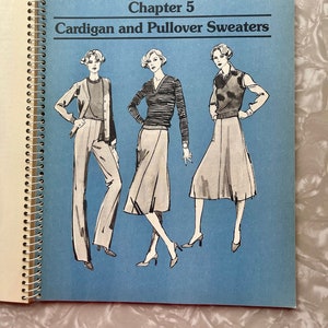 May include: A vintage sewing book with a blue cover featuring an illustration of three women wearing different styles of cardigans and pullovers. The title of the book is "Chapter 5 Cardigan and Pullover Sweaters".
