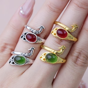 Anel de crochê pavão ajustável – Ferramenta vintage para medir a tensão do fio, com pedras rubi e esmeralda.