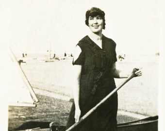 vintage photo 1924 lady in bathing suit Holds Canoe Paddle by Beach