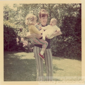 vintage photo 1974 Hippie Mom Stripe Bell Bottoms Holds 2 Children in Ea Arms Color 25 D