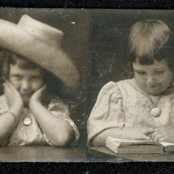 vintage photo 1920 Little Girl REads Book gem miniature photo strip