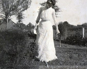 vintage photo 1905 Woman Elegant Fashion on Lawn Holding the Letter Looks down to LAwn43 I