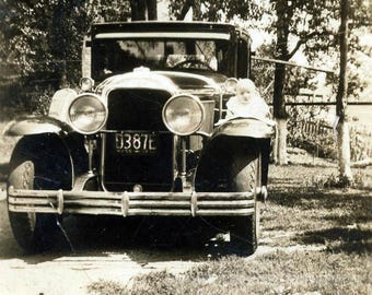 vintage photo 1930s Baby 3 months old As Dangerous Hood Ornament Buick Sedan Mass Plates28 T