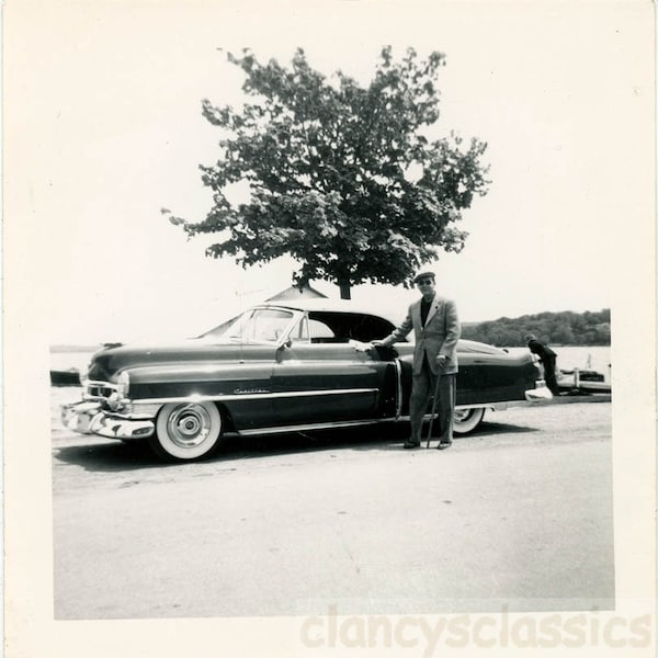 vintage photo 1950s Man next to His Cadillac White Wheels Sun glints off Chrome 70 D