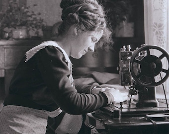 Vintage photo Print Seamstress at Her Sewing Machine in Window Light