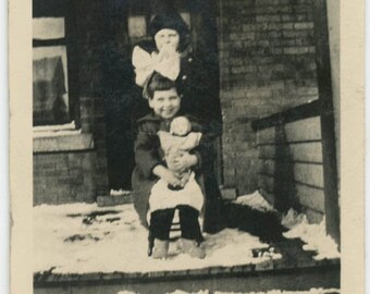 vintage photo Two girls on front Porch One Has Giant Hair Bow and Doll 9G