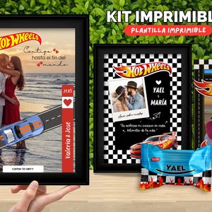 May include: A set of framed prints with Hot Wheels branding and romantic themes. The prints show a couple on a beach, a photo with names, and a design with flames. A blue candy wrapper with the name "YAEL" is also included.