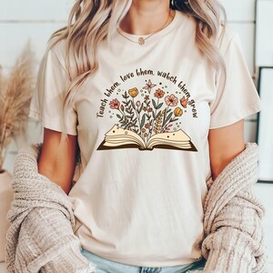 Teacher T-Shirt: Floral Book Design, Unisex Cotton Tee