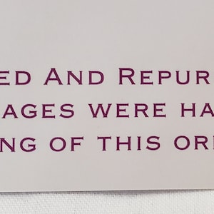 May include: Recycled and repurposed ornament with the text "Recycled and Repurposed No Beverages Were Harmed in the Making of This Ornament".