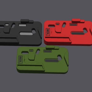 May include: Three plastic phone cases in black, red, and green. Each case has a raised design and the text "MDL" printed on the side.