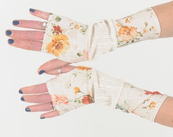 Geblümte Armstulpen in einem Patchwork aus bedrucktem und perforiertem Jersey, Damen Accessoires, MALAM