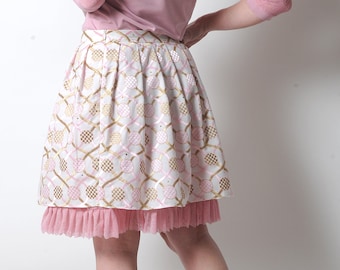 White and pink short pleated skirt with geometric pattern, golden beige details, MALAM, size UK 12