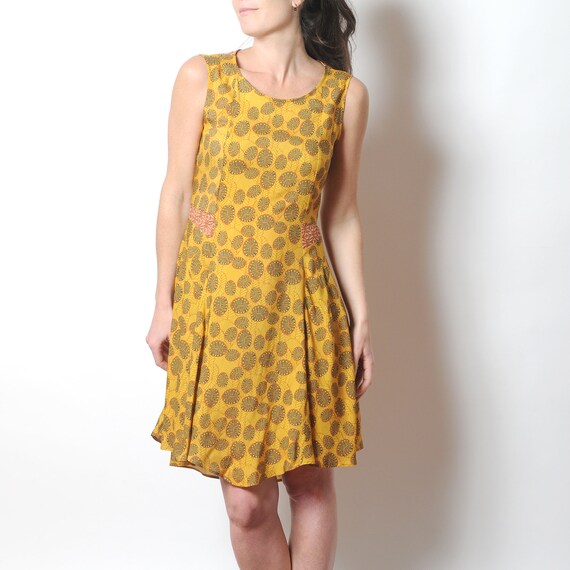 mustard yellow sleeveless dress