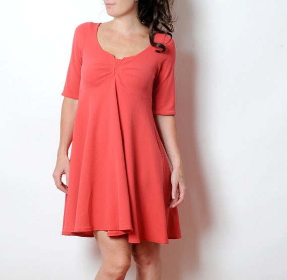 Coral red jersey dress with pleated 