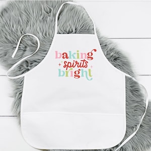 Tablier Fêtes de Noël lumineuses de Baking Spirits