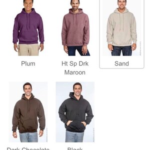 May include: A selection of hooded sweatshirts in various colors, including plum, dark maroon, sand, dark chocolate, and black. Each sweatshirt features a front pocket and a drawstring hood. The color names are displayed below each sweatshirt.