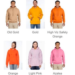 May include: A collection of hooded sweatshirts in various colors, including Old Gold, Gold, High Viz Safety Orange, Orange, Light Pink, and Azalea. Each sweatshirt features a front pocket and a drawstring hood.