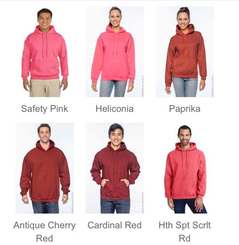 May include: A collection of six hooded sweatshirts in various colors, including Safety Pink, Heliconia, Paprika, Antique Cherry Red, Cardinal Red, and Hth Spt Scrlt Rd. Each sweatshirt features a drawstring hood and a front pocket. The names of the colors are displayed below each sweatshirt.