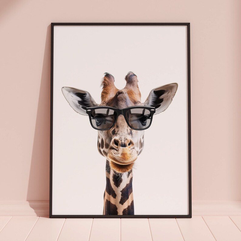 May include: A black and white photo of a giraffe wearing black sunglasses. The giraffe is looking directly at the camera. The background is white.