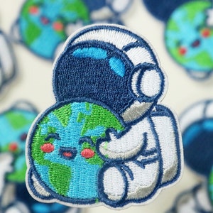 serietidning astronaut och jorden lapp, stryklapp, broderad lapp, rolig lapp, cool lapp