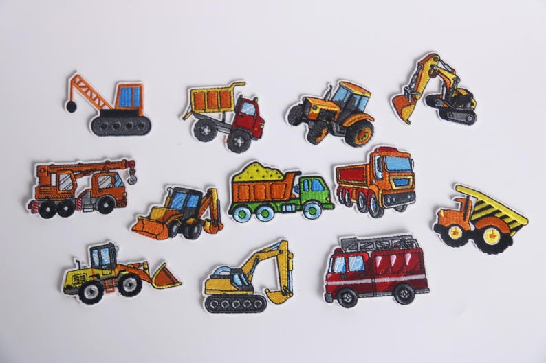 May include: A set of ten embroidered iron-on patches featuring various construction vehicles, including a crane, dump truck, tractor, excavator, and bulldozer. The patches are colorful and detailed, with a cartoon-like style.