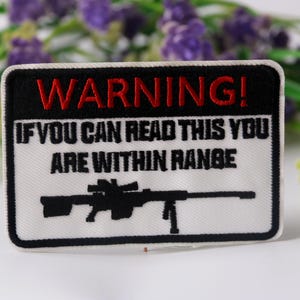 lapp inom räckhåll, stryklapp, prickskyttegevärslapp, broderad lapp, rolig lapp, cool lapp, för väst, för tygväska