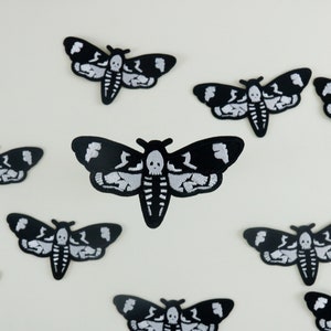 dödshuvudmalslapp, stryklapp, broderad lapp, rolig lapp, cool lapp