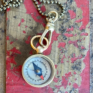 Compass Fob Necklace. Gold Tones.