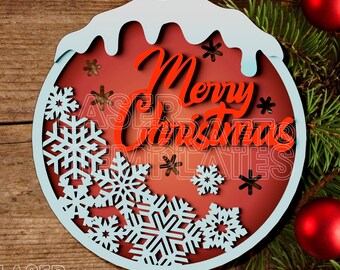 May include: Red and white wooden Christmas ornament with the words "Merry Christmas" and snowflakes cut out.