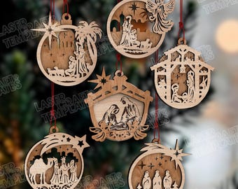 May include: A collection of six wooden Christmas ornaments with religious themes. Each ornament is laser-cut with intricate designs depicting scenes from the Nativity, including the Holy Family, angels, and the Three Wise Men. The ornaments hang from red strings.