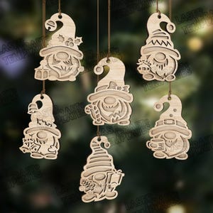 May include: Wooden gnome ornaments with various designs, including gnomes holding lanterns, gifts, and mugs. Each ornament is laser-cut with intricate details and suspended by a brown string. The ornaments are a light brown color and are perfect for holiday decorations.