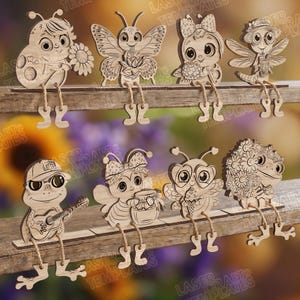 May include: Wooden cutouts of various cartoon insects, including a ladybug, butterfly, and bee, are depicted sitting on a wooden plank. Each insect has dangling legs and is holding an item, such as a flower or a guitar. The cutouts are unpainted and have a natural wood finish.