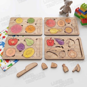 May include: Wooden fruit and vegetable puzzles with removable pieces, including a lemon, orange, apple, and bell pepper. Each puzzle has a wooden knife. Educational toy for children.