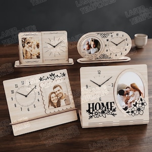 May include: A collection of wooden clocks with photo frames. The clocks have black hands and numerals. One clock has the word "HOME" with floral accents. The clocks are on a dark wooden surface.